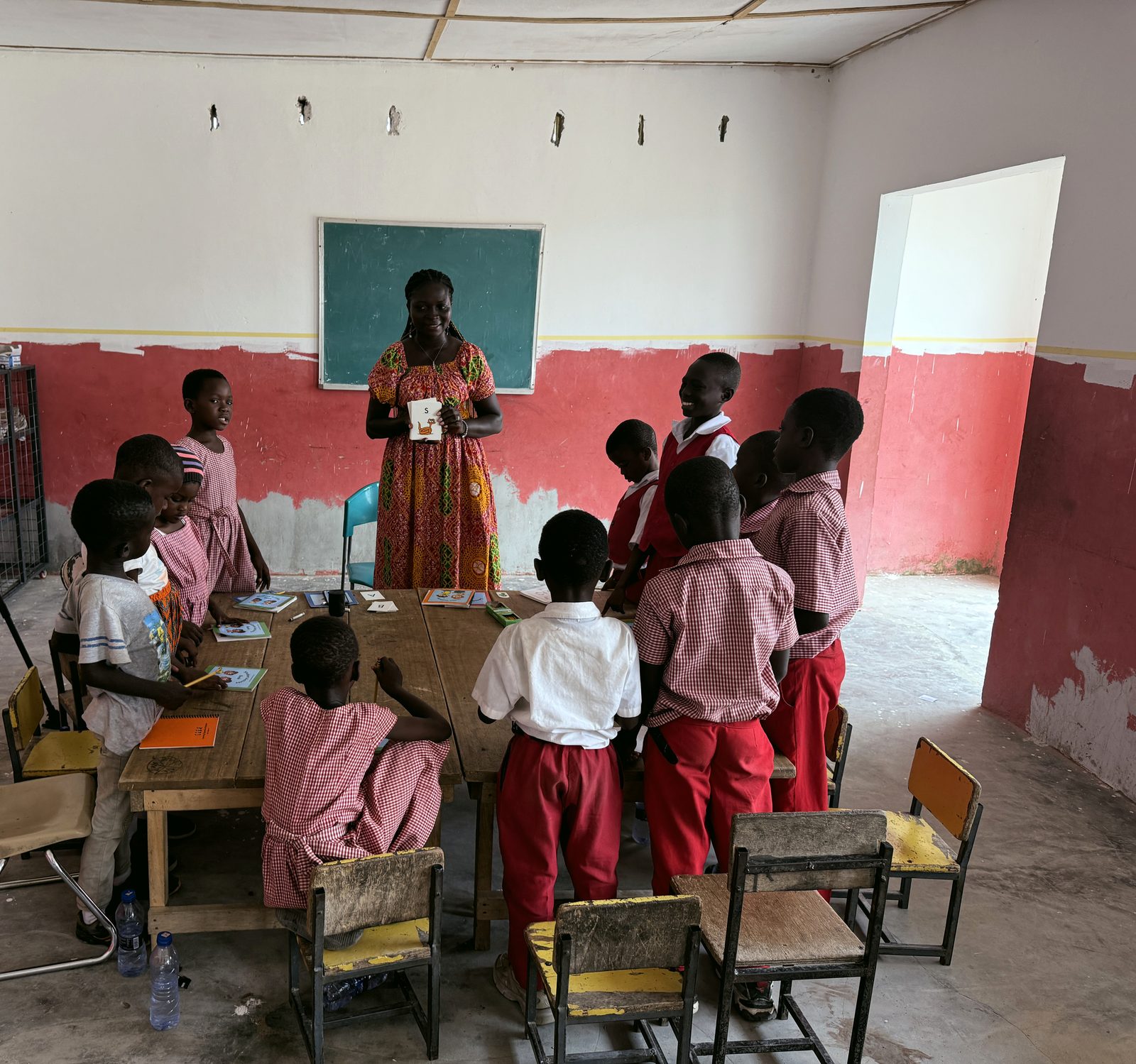 A Ghanaian teacher leading a reading lesson