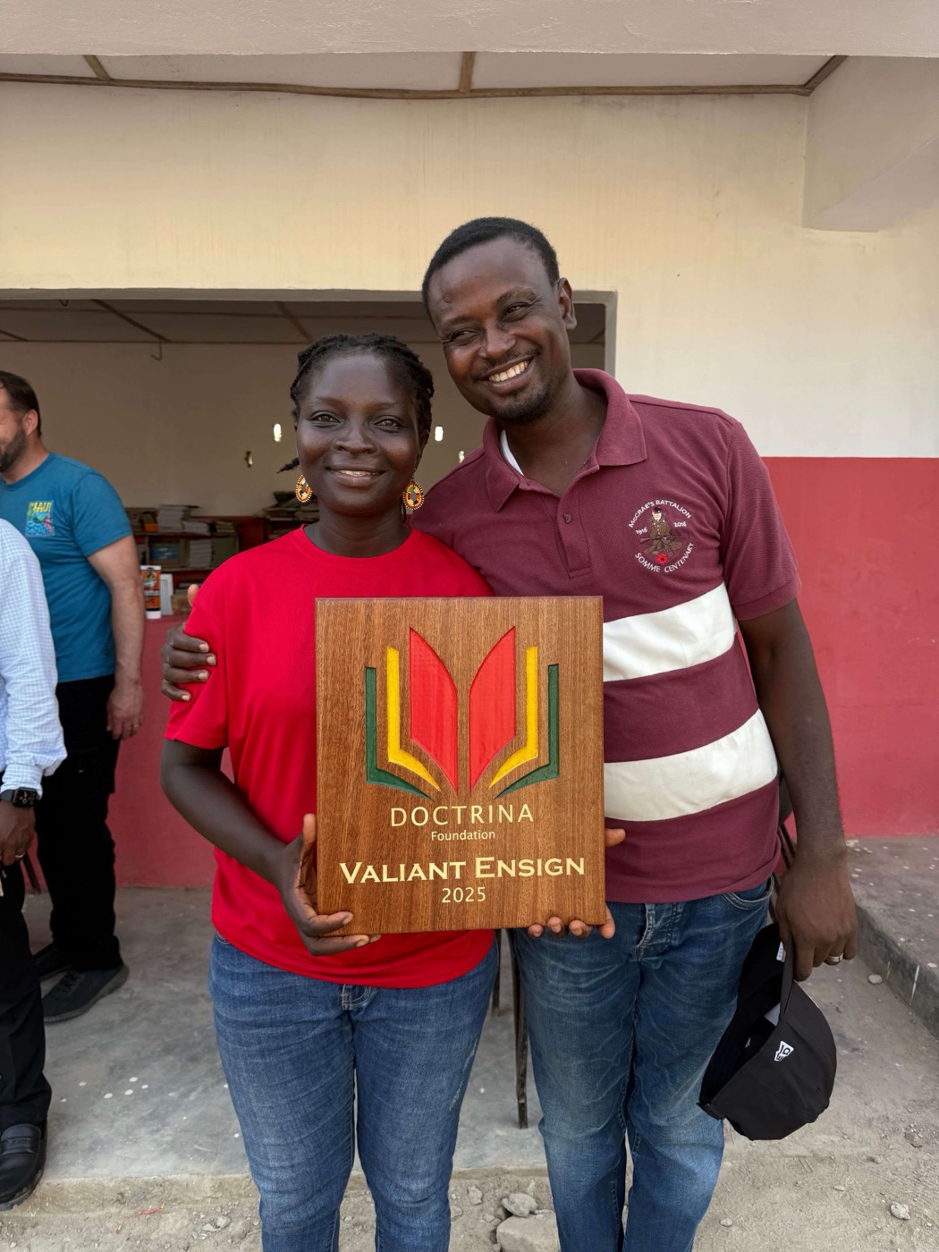 Jemima Adeola holding a Doctrina Foundation Valiant Ensign 2025 plaque
